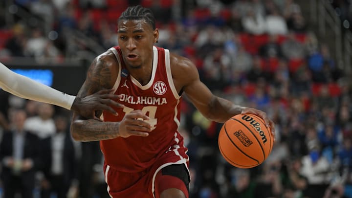 Oklahoma forward Jalon Moore drives in the NCAA Tournament against UConn.