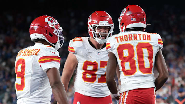 Sep 21, 2025; East Rutherford, New Jersey, USA; Kansas City Chiefs wide receiver Tyquan Thornton (80) celebrates with tight end Travis Kelce (87) and wide receiver Juju Smith-Schuster (9) after a reception against the New York Giants in the fourth quarter at MetLife Stadium. Mandatory Credit: Vincent Carchietta-Imagn Images | Vincent Carchietta-Imagn Images