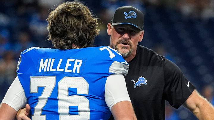 Detroit Lions head coach Dan Campbell hugs offensive tackle Blake Miller (76) pregame before Saints game at Ford Field Detroit Lions head coach Dan Campbell hugs offensive tackle Blake Miller (76) pregame before Saints game at Ford Field
