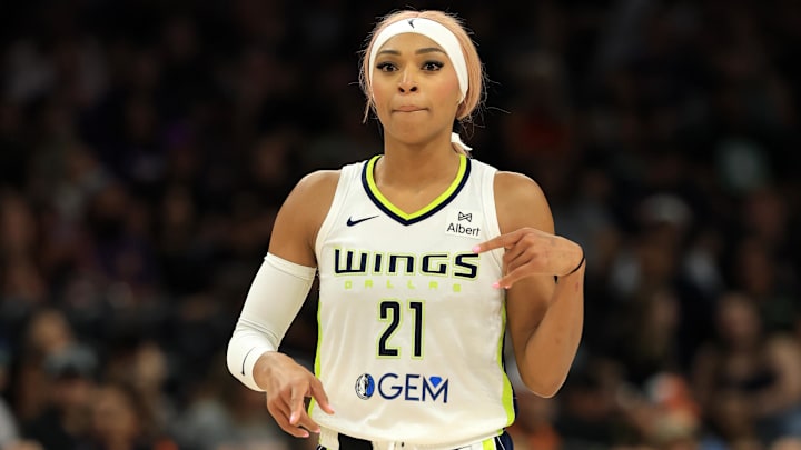 Jun 11, 2025; Phoenix, Arizona, USA; Dallas Wings guard DiJonai Carrington (21) against the Phoenix Mercury at PHX Arena. Mandatory Credit: Mark J. Rebilas-Imagn Images