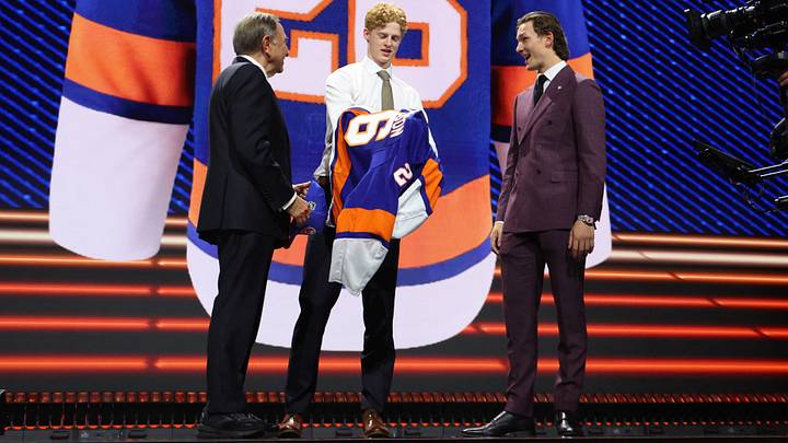 Jun 26, 2026; Buffalo, New York, USA; Malte Gustafsson reacts beside NHL commissioner Gary Bettman and New York Islanders player Matthew Schaefer after being selected with the thirteenth pick in the first round of the 2026 NHL Draft by the Islanders at KeyBank Center. Mandatory Credit: Timothy T. Ludwig-Imagn Images Jun 26, 2026; Buffalo, New York, USA; Malte Gustafsson reacts beside NHL commissioner Gary Bettman and New York Islanders player Matthew Schaefer after being selected with the thirteenth pick in the first round of the 2026 NHL Draft by the Islanders at KeyBank Center. Mandatory Credit: Timothy T. Ludwig-Imagn Images