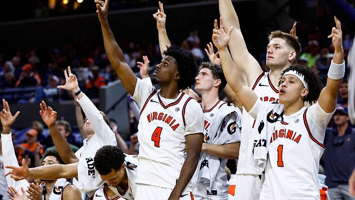 Virginia men's basketball celebrates a shot against Richmond. Virginia men's basketball celebrates a shot against Richmond.