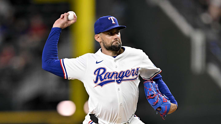Jul 2, 2025; Arlington, Texas, USA; Texas Rangers starting pitcher Nathan Eovaldi (17) pitches against the Baltimore Orioles during the first inning at Globe Life Field. 