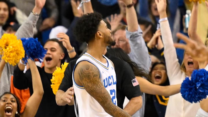 Feb 21, 2026; Los Angeles, California, USA; UCLA guard Donovan Dent (2) reacts after scoring the winning basket at the buzzer in overtime against the Illinois Fighting Illini at Pauley Pavilion presented by Wescom Financial. Mandatory Credit: Robert Hanashiro-Imagn Images Feb 21, 2026; Los Angeles, California, USA; UCLA guard Donovan Dent (2) reacts after scoring the winning basket at the buzzer in overtime against the Illinois Fighting Illini at Pauley Pavilion presented by Wescom Financial. Mandatory Credit: Robert Hanashiro-Imagn Images