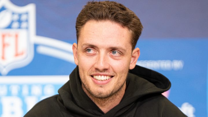 Feb 27, 2026; Indianapolis, IN, USA; Miami quarterback Carson Beck (QB04) speaks to members of the media during the NFL Combine at the Indiana Convention Center. 