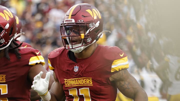 Nov 10, 2024; Landover, Maryland, USA; Washington Commanders safety Jeremy Chinn (11) celebrates after intercepting a pass against the Pittsburgh Steelers during the second half at Northwest Stadium. Mandatory Credit: Amber Searls-Imagn Images Nov 10, 2024; Landover, Maryland, USA; Washington Commanders safety Jeremy Chinn (11) celebrates after intercepting a pass against the Pittsburgh Steelers during the second half at Northwest Stadium. Mandatory Credit: Amber Searls-Imagn Images