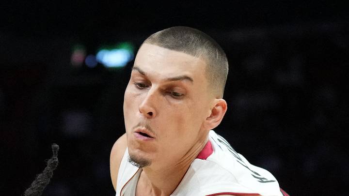 Atlanta Hawks guard Keaton Wallace (2) drives past Miami Heat guard Tyler Herro (14) during the first half at Kaseya Center on Apr 12, 2026.