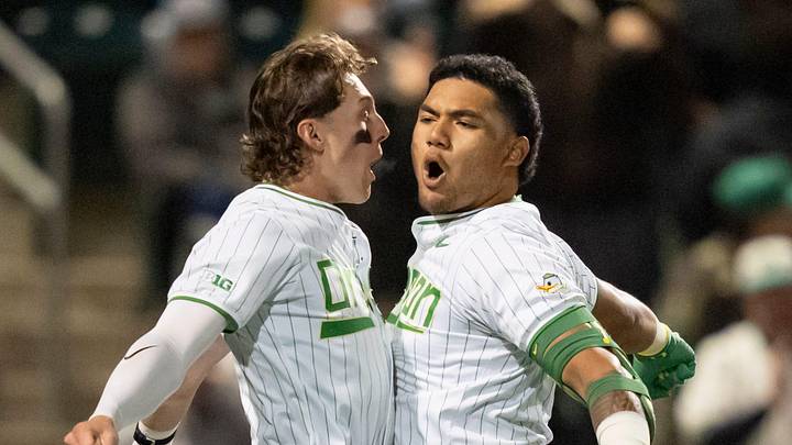 Oregon’s Drew Smith, left, and Naulivou Lauaki Jr. celebrate a home run by Lauaki as the Oregon Ducks host the USC Trojans on May 14, 2026, in Eugene, Oregon. Oregon’s Drew Smith, left, and Naulivou Lauaki Jr. celebrate a home run by Lauaki as the Oregon Ducks host the USC Trojans on May 14, 2026, in Eugene, Oregon.