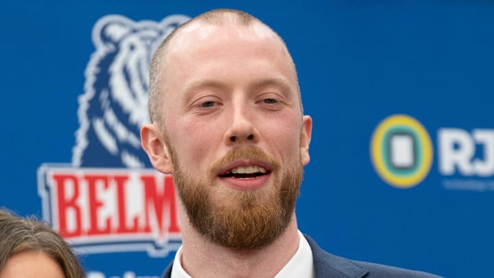Belmont University’s new men’s basketball coach Evan Bradds stands for pictures with his wife of nearly five years, MacKenzie Bradds, and his New Jersey at Belmont University Wednesday, April 1, 2026.