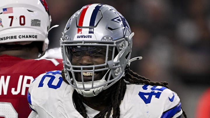 Nov 3, 2025; Arlington, Texas, USA; Dallas Cowboys defensive end Jadeveon Clowney (42) celebrates after he sacks Arizona Cardinals quarterback Jacoby Brissett (7) during the game between the Dallas Cowboys and the Arizona Cardinals at AT&T Stadium. Mandatory Credit: Jerome Miron-Imagn Images