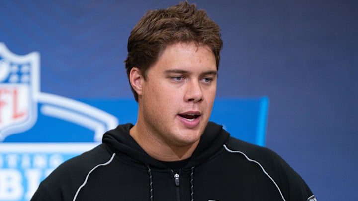 Feb 28, 2026; Indianapolis, IN, USA; Utah offensive lineman Caleb Lomu (OL33) speaks to members of the media during the NFL Combine at the Indiana Convention Center. Mandatory Credit: Jacob Musselman-Imagn Images