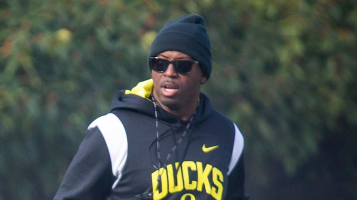New co-defensive coordinator and safeties coach Chris Hampton, right, joins the first practice of spring for Oregon football as they prepare for the 2023 season.

Eug 031623 Uo Spring Fb 06