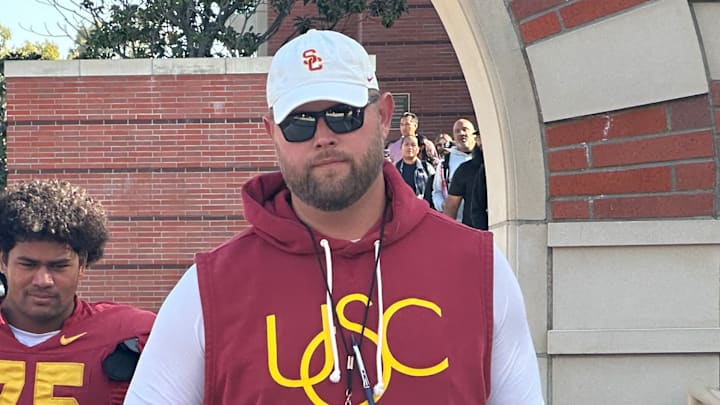 USC Trojans offensive line coach Zach Hanson and freshman offensive tackle Chase Deniz