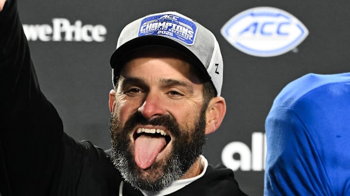 Dec 6, 2025; Charlotte, NC, USA; Duke Blue Devils head coach Manny Diaz celebrates defeating the Virginia Cavaliers at the 2025 ACC Championship game at Bank of America Stadium. Mandatory Credit: Bob Donnan-Imagn Images
