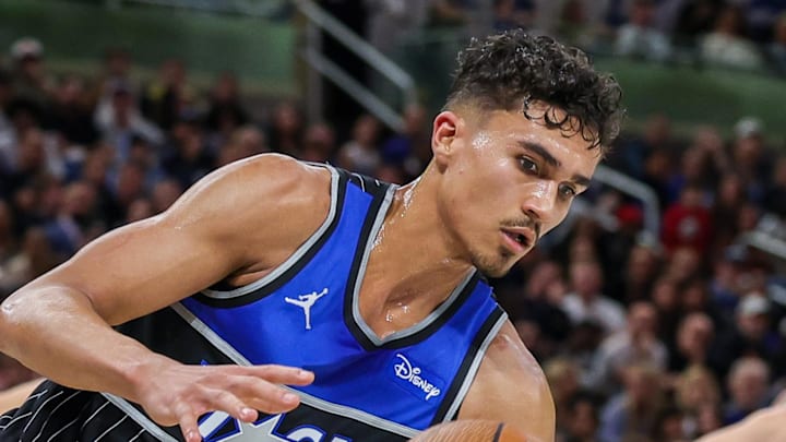 Orlando Magic forward Tristan da Silva grabs the rebound during the second quarter against the Brooklyn Nets.