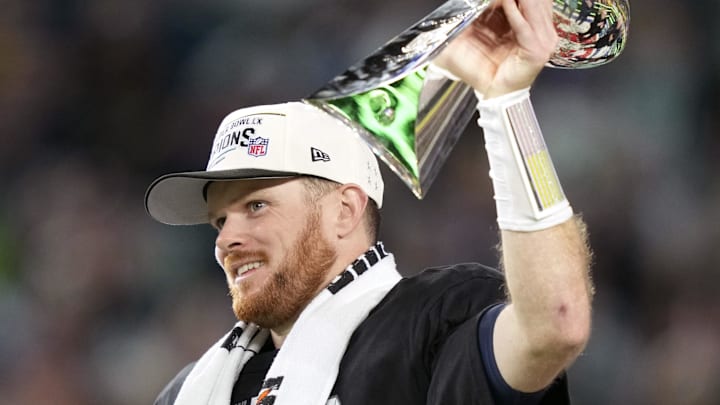 Seattle Seahawks quarterback Sam Darnold celebrates with the Vince Lombardi trophy.
