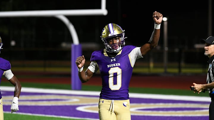 Booker's defensive back/wide receiver Chauncey Kennon (#0) celebrates a touchdown. The Booker Tornadoes hosted the Lely Trojans (Naples, FL) Friday night, Aug. 23, 2024, who lost to Booker 46-0 during the first regular non-conference season game of the year. Booker's defensive back/wide receiver Chauncey Kennon (#0) celebrates a touchdown. The Booker Tornadoes hosted the Lely Trojans (Naples, FL) Friday night, Aug. 23, 2024, who lost to Booker 46-0 during the first regular non-conference season game of the year.