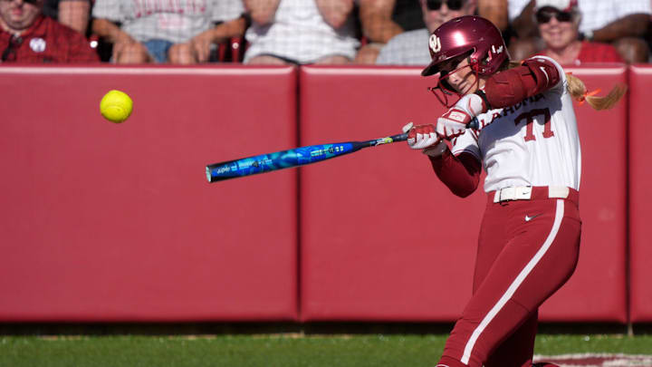 Oklahoma infielder Sydney Barker gets a hit at Love's Field.