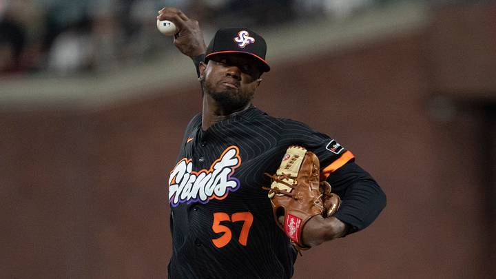 May 5, 2026; San Francisco, California, USA; San Francisco Giants pitcher Gregory Santos (57) pitches during the seventh inning against the San Diego Padres at Oracle Park. Mandatory Credit: Stan Szeto-Imagn Images