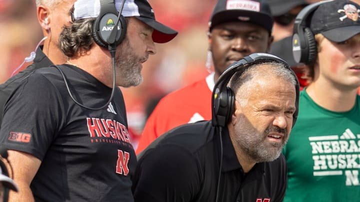 Nebraska defensive coordinator John Butler (left) and head coach Matt Rhule discuss strategy.
