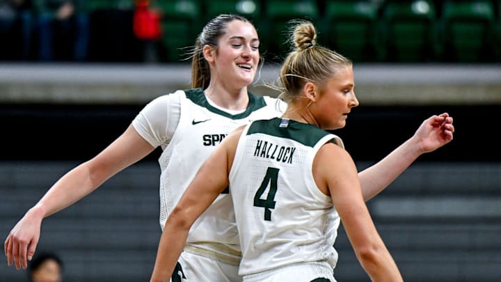 Michigan State's Grace VanSlooten, left, and Theryn Hallock celebrate a score against Wayne State during the first quarter on Monday, Oct. 28, 2024, in East Lansing. Michigan State's Grace VanSlooten, left, and Theryn Hallock celebrate a score against Wayne State during the first quarter on Monday, Oct. 28, 2024, in East Lansing.