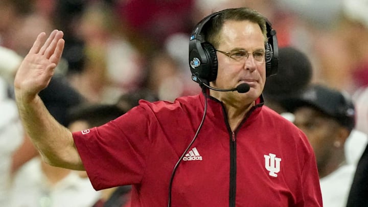 Indiana coach Curt Cignetti walks the sideline during the Big Ten football championship against the Ohio State Buckeyes at Lucas Oil Stadium in Indianapolis. Indiana coach Curt Cignetti walks the sideline during the Big Ten football championship against the Ohio State Buckeyes at Lucas Oil Stadium in Indianapolis.