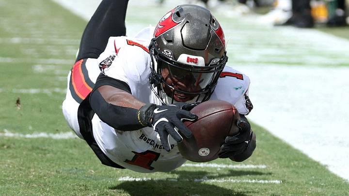 Oct 4, 2026; Tampa, Florida, USA;  Tampa Bay Buccaneers running back Kenny Gainwell (1) dives for a touchdown against the Green Bay Packers during the fourth quarter at Raymond James Stadium.  Mandatory Credit: Matt Pendleton-Imagn Images     TPX IMAGES OF THE DAY