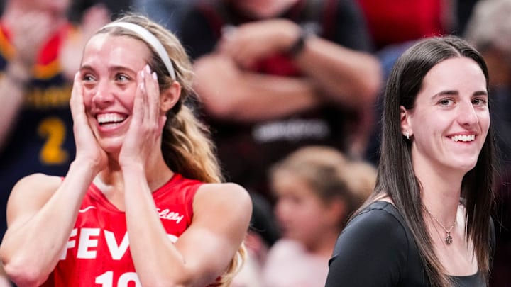 Indiana Fever guard Lexie Hull (10) and Indiana Fever guard Caitlin Clark (22) smile from the bench Friday, Sept. 5, 2025, during a game between the Indiana Fever and the Chicago Sky at Gainbridge Fieldhouse in Indianapolis. The Indiana Fever defeated the Chicago Sky, 97-77.