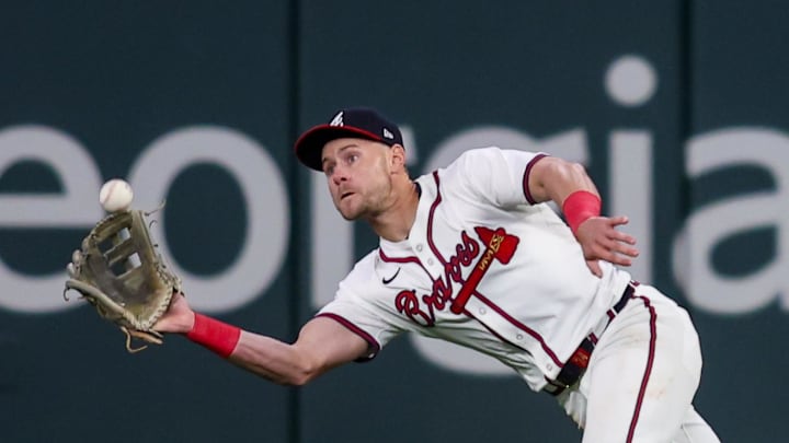 Apr 8, 2025; Atlanta, Georgia, USA; Atlanta Braves right fielder Jarred Kelenic (24) catches a fly ball against the Philadelphia Phillies in the ninth inning at Truist Park. Mandatory Credit: Brett Davis-Imagn Images Apr 8, 2025; Atlanta, Georgia, USA; Atlanta Braves right fielder Jarred Kelenic (24) catches a fly ball against the Philadelphia Phillies in the ninth inning at Truist Park. Mandatory Credit: Brett Davis-Imagn Images