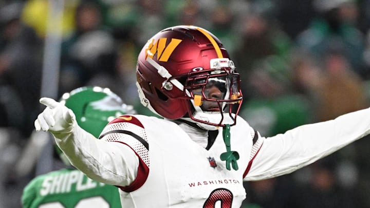 Washington Commanders cornerback Mike Sainristil celebrates after Philadelphia Eagles failed.