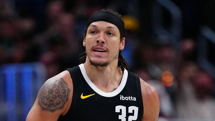 Apr 4, 2026; Denver, Colorado, USA; Denver Nuggets forward Aaron Gordon (32) reacts to his three point score in the second half against the San Antonio Spurs at Ball Arena. Mandatory Credit: Ron Chenoy-Imagn Images