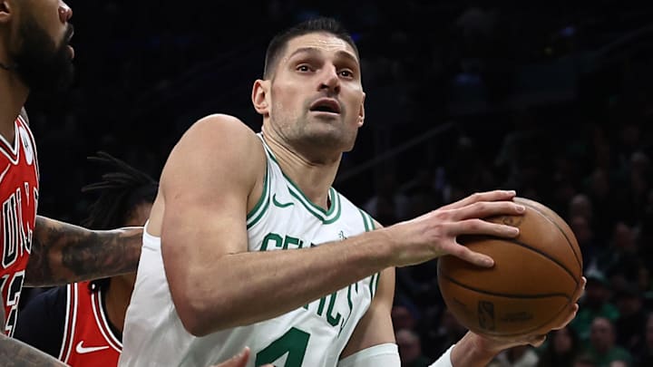 Feb 11, 2026; Boston, Massachusetts, USA; Boston Celtics center Nikola Vucevic (4) drives on Chicago Bulls center Nick Richards (13) during the first quarter at TD Garden. Mandatory Credit: Winslow Townson-Imagn Images Feb 11, 2026; Boston, Massachusetts, USA; Boston Celtics center Nikola Vucevic (4) drives on Chicago Bulls center Nick Richards (13) during the first quarter at TD Garden. Mandatory Credit: Winslow Townson-Imagn Images