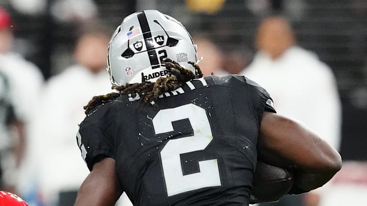 Jan 4, 2026; Paradise, Nevada, USA; Kansas City Chiefs safety Chamarri Conner (27) misses a tackle attempt against Las Vegas Raiders running back Ashton Jeanty (2) during the fourth quarter at Allegiant Stadium. Mandatory Credit: Stephen R. Sylvanie-Imagn Images Jan 4, 2026; Paradise, Nevada, USA; Kansas City Chiefs safety Chamarri Conner (27) misses a tackle attempt against Las Vegas Raiders running back Ashton Jeanty (2) during the fourth quarter at Allegiant Stadium. Mandatory Credit: Stephen R. Sylvanie-Imagn Images
