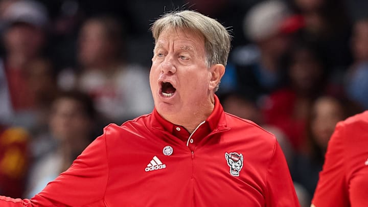 Nov 9, 2025; Charlotte, North Carolina, USA; NC State Wolfpack head coach Wes Moore in action against the Southern California Trojans during the fourth quarter of the Ally Tipoff game at Spectrum Center. Mandatory Credit: Cory Knowlton-Imagn Images Nov 9, 2025; Charlotte, North Carolina, USA; NC State Wolfpack head coach Wes Moore in action against the Southern California Trojans during the fourth quarter of the Ally Tipoff game at Spectrum Center. Mandatory Credit: Cory Knowlton-Imagn Images