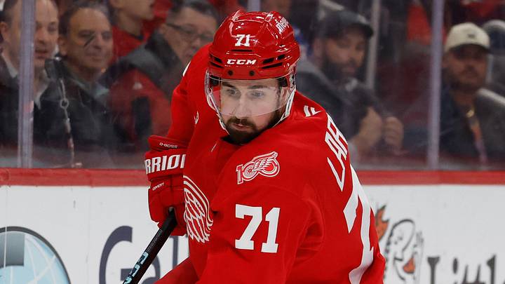 Apr 7, 2026; Detroit, Michigan, USA;  Detroit Red Wings center Dylan Larkin (71) skates with the puck in the first period against the Columbus Blue Jackets at Little Caesars Arena. Mandatory Credit: Rick Osentoski-Imagn Images