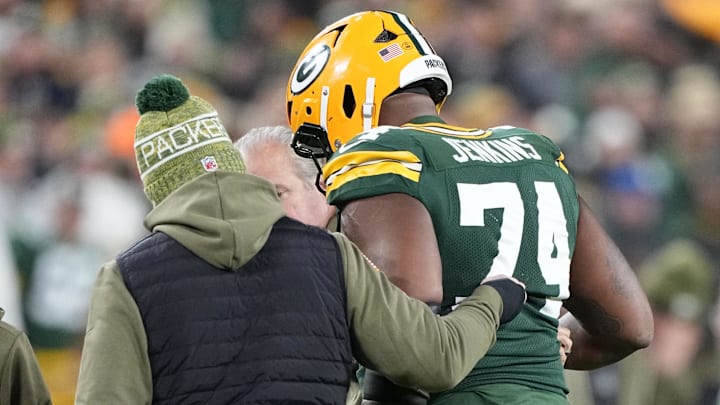 Nov 10, 2025; Green Bay, Wisconsin, USA; Green Bay Packers guard Elgton Jenkins (74) comes off the file with an apparent injury against the Green Bay Packers in the first half at Lambeau Field.