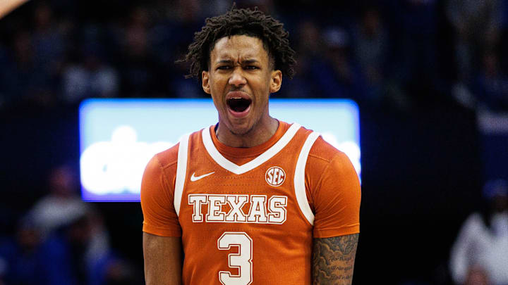 Texas Longhorns forward Dailyn Swain (3) celebrates after center Matas Vokietaitis (8) scores a basket during the first half against the Kentucky Wildcats at Rupp Arena at Central Bank Center.