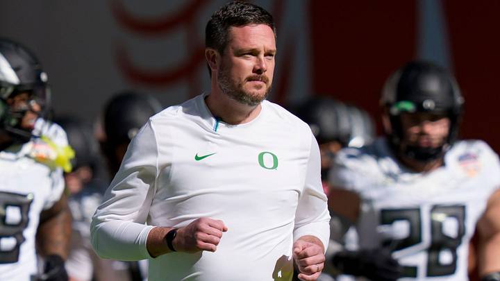 Oregon head coach Dan Lanning takes the field with his team for warmups as the Oregon Ducks take on the Texas Tech Red Raiders in the Orange Bowl on Jan. 1, 2026, at Hard Rock Stadium in Miami, Florida. Oregon head coach Dan Lanning takes the field with his team for warmups as the Oregon Ducks take on the Texas Tech Red Raiders in the Orange Bowl on Jan. 1, 2026, at Hard Rock Stadium in Miami, Florida.