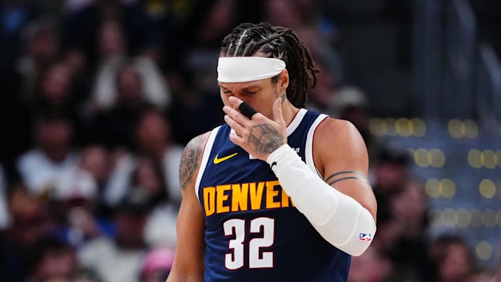 Jan 9, 2026; Denver, Colorado, USA; Denver Nuggets forward Aaron Gordon (32) reacts following an injury to his nose in the second half against the Atlanta Hawks at Ball Arena.
