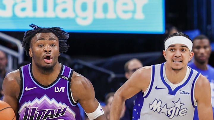 Utah Jazz guard Isaiah Collier brings the ball up court during the second half.