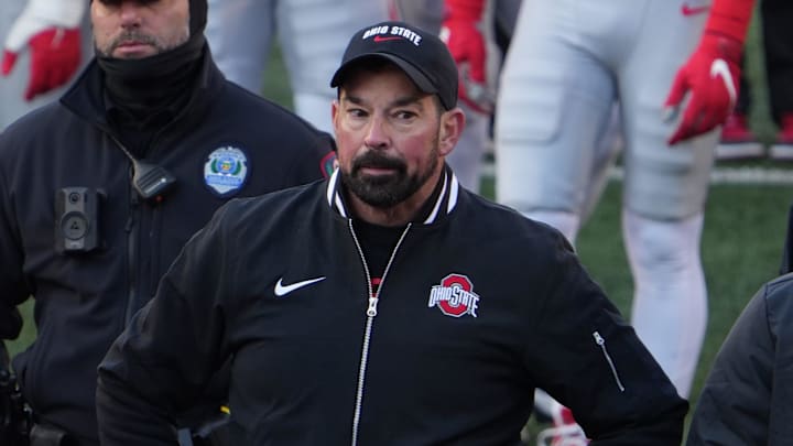 Ohio State University football coach Ryan Day tries to join the team to sing Carmen Ohio after the Michigan game Saturday, November 30, 2024 in Ohio Stadium. As he was standing here, the melee was starting behind him as Michigan players tried to plant a flag at midfield. Ohio State University football coach Ryan Day tries to join the team to sing Carmen Ohio after the Michigan game Saturday, November 30, 2024 in Ohio Stadium. As he was standing here, the melee was starting behind him as Michigan players tried to plant a flag at midfield.