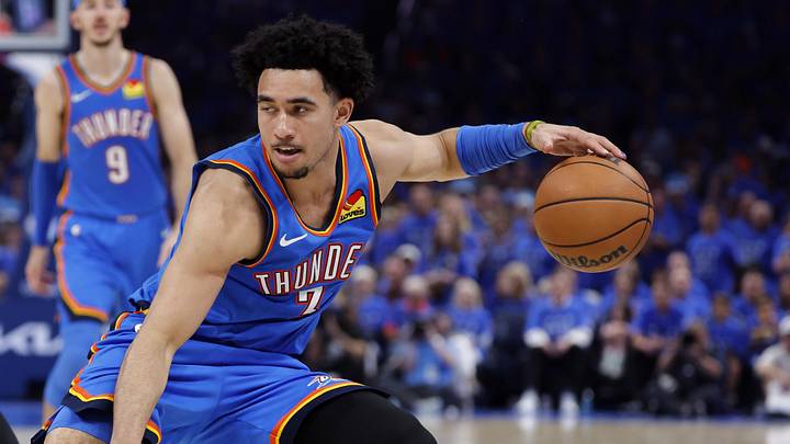 May 30, 2026; Oklahoma City, Oklahoma, USA; Oklahoma City Thunder guard Jared McCain (3) controls the ball against San Antonio Spurs forward Julian Champagnie (30) in the fourth quarter during game seven of the western conference finals for the 2026 NBA playoffs at Paycom Center. Mandatory Credit: Alonzo Adams-Imagn Images