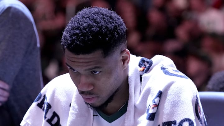 Milwaukee Bucks forward Giannis Antetokounmpo sits on the bench during a time out against the Orlando Magic. Milwaukee Bucks forward Giannis Antetokounmpo sits on the bench during a time out against the Orlando Magic.