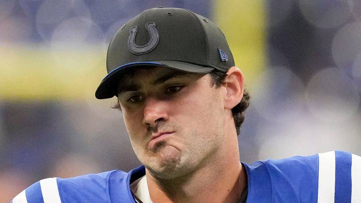 Indianapolis Colts quarterback Daniel Jones leaves the field  after losing to the Baltimore Ravens 