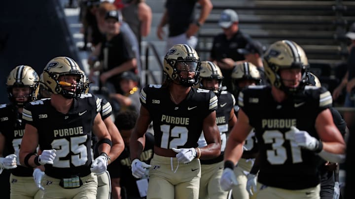 Purdue Boilermakers take the field to warm up Purdue Boilermakers take the field to warm up