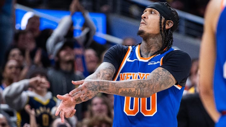 Mar 13, 2026; Indianapolis, Indiana, USA; New York Knicks guard Jordan Clarkson (00) celebrates a made basket in the second half against the Indiana Pacers at Gainbridge Fieldhouse. Mandatory Credit: Trevor Ruszkowski-Imagn Images