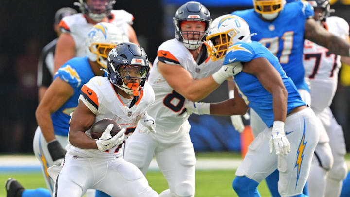 Sep 21, 2025; Inglewood, California, USA; Denver Broncos running back J.K. Dobbins (27) runs the ball during the second half against the Los Angeles Chargers at SoFi Stadium. Sep 21, 2025; Inglewood, California, USA; Denver Broncos running back J.K. Dobbins (27) runs the ball during the second half against the Los Angeles Chargers at SoFi Stadium.