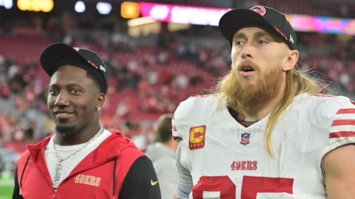 Jan 5, 2025; Glendale, Arizona, USA;  San Francisco 49ers tight end George Kittle (85) and wide receiver Deebo Samuel Sr. (1) look on after losing to the Arizona Cardinals at State Farm Stadium. Mandatory Credit: Matt Kartozian-Imagn Images