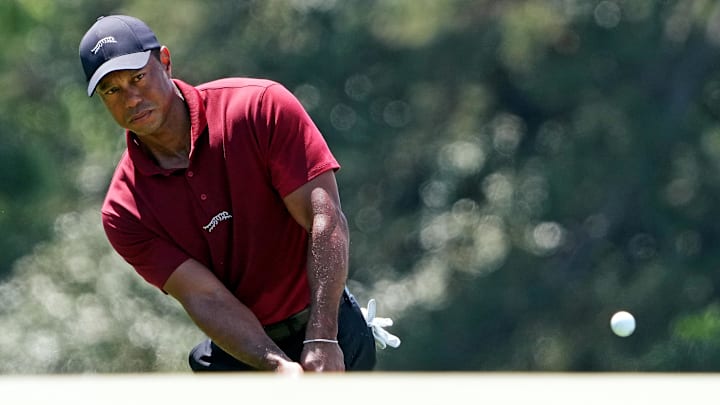 Woods made the cut for a record-breaking 24th straight Masters.