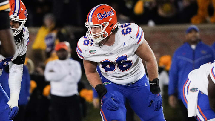 Nov 18, 2023; Columbia, Missouri, USA; Florida Gators offensive lineman Jake Slaughter (66) at the line of scrimmage against the Missouri Tigers during the game at Faurot Field at Memorial Stadium. Mandatory Credit: Denny Medley-Imagn Images